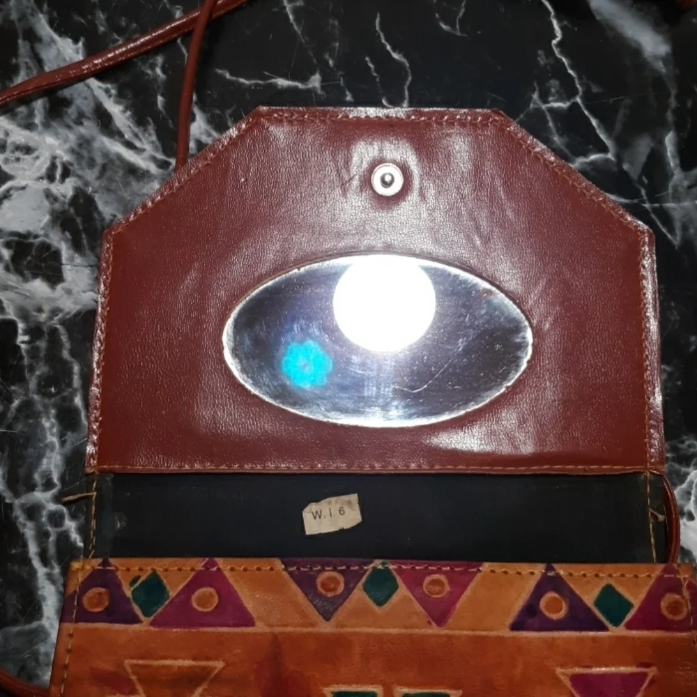 Genuine leather hand tooled in India